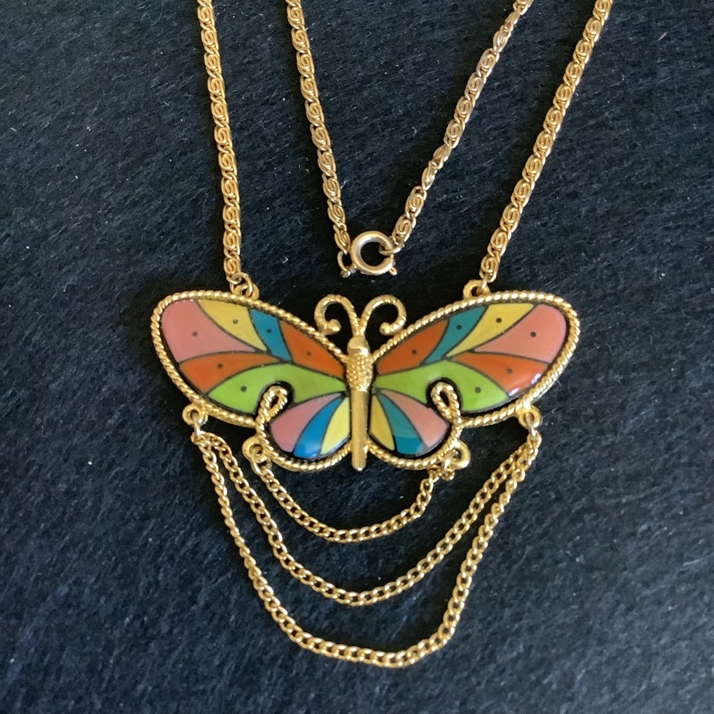 Vintage gold tone color enamel butterfly necklace.